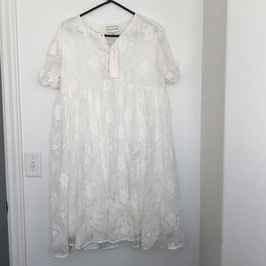 Gorgeous embroidered white dress.